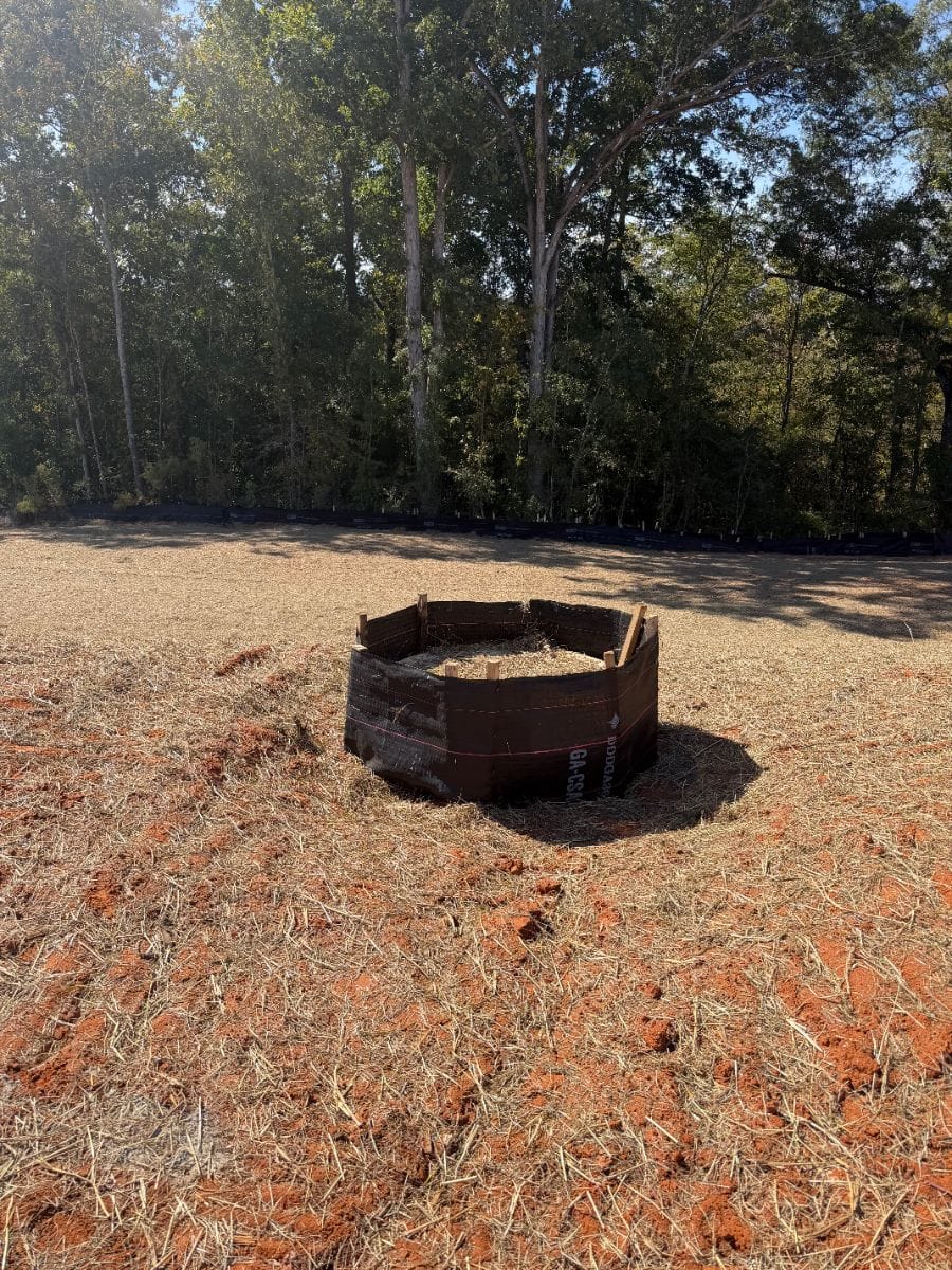 Inlet protection around a drain on a strawed site